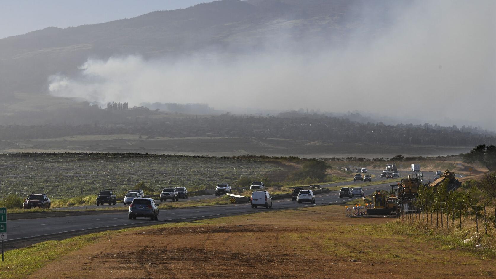 People in Hawaii flee into ocean to escape wildfires that are burning a popular Maui tourist town